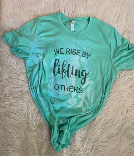 We rise by lifting others fundraiser shirt